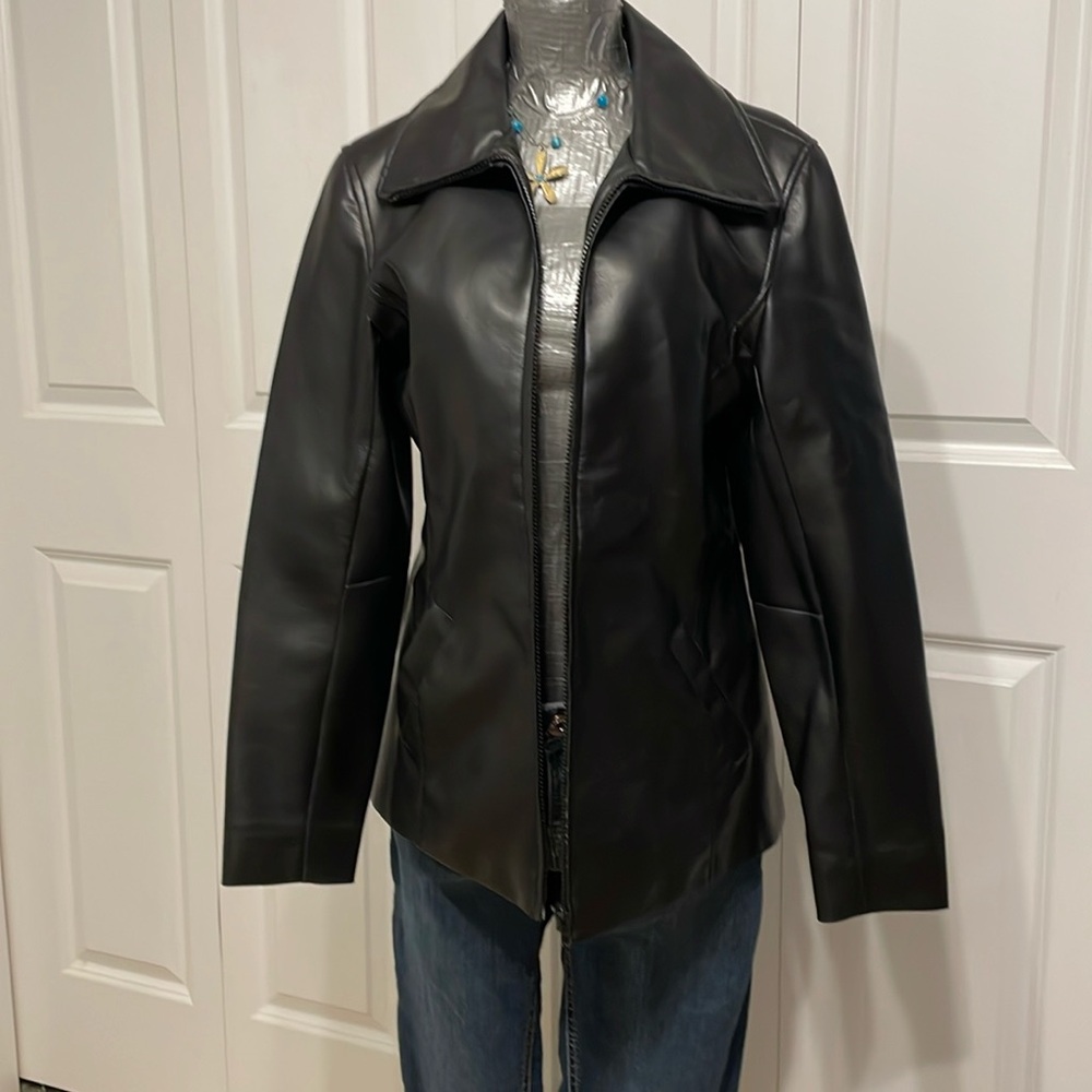 Faux leather jacket fits like medium by Marco